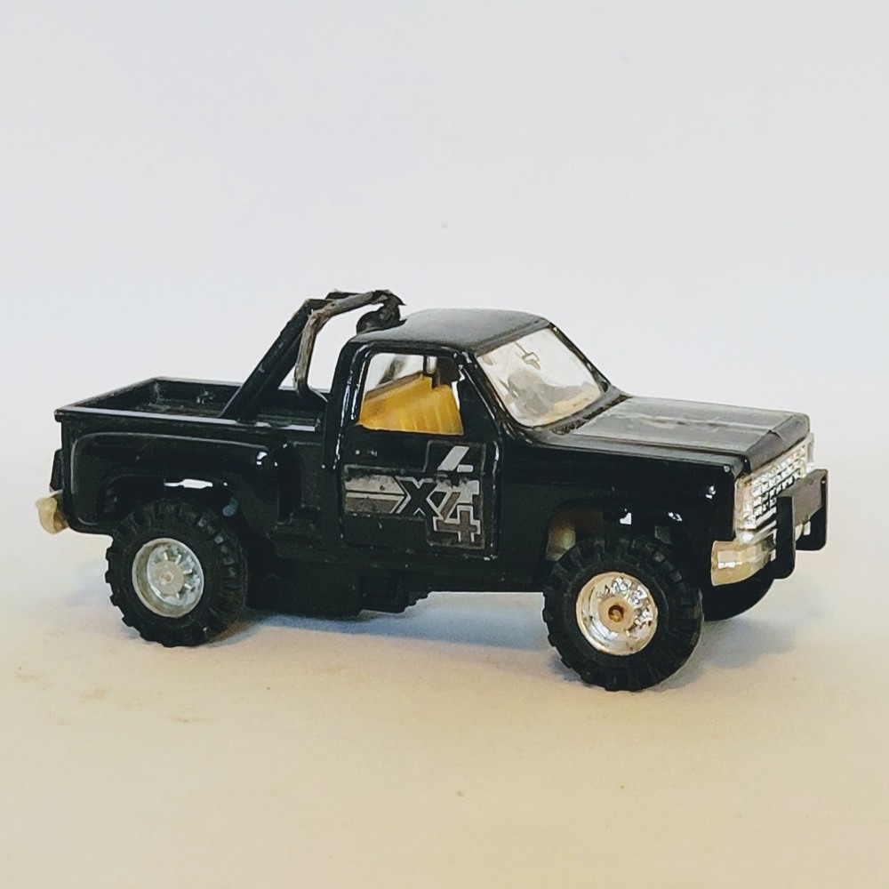 Vintage 1980's 4x4 Chevy Pickup Truck With Pullback Release And Working Doors.